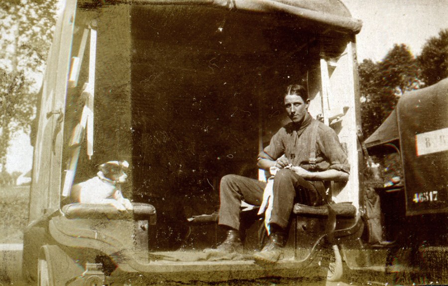 Punch the dog and W. Roylance in the back of an ambulance