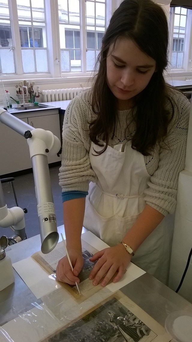 Carrying out tape removal In the studio at Camberwell